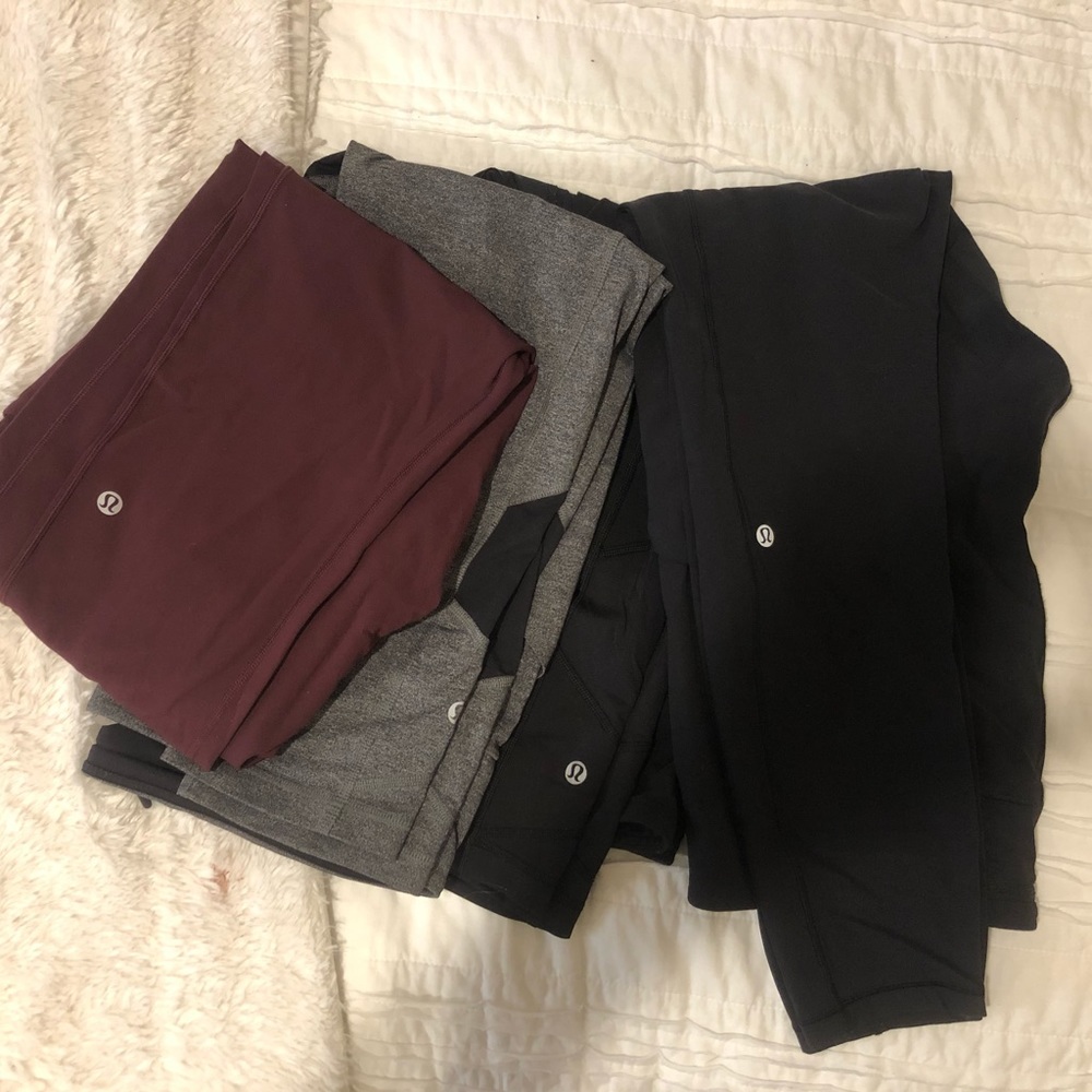FOUR PAIRS of LULU LEMON LEGGINGS